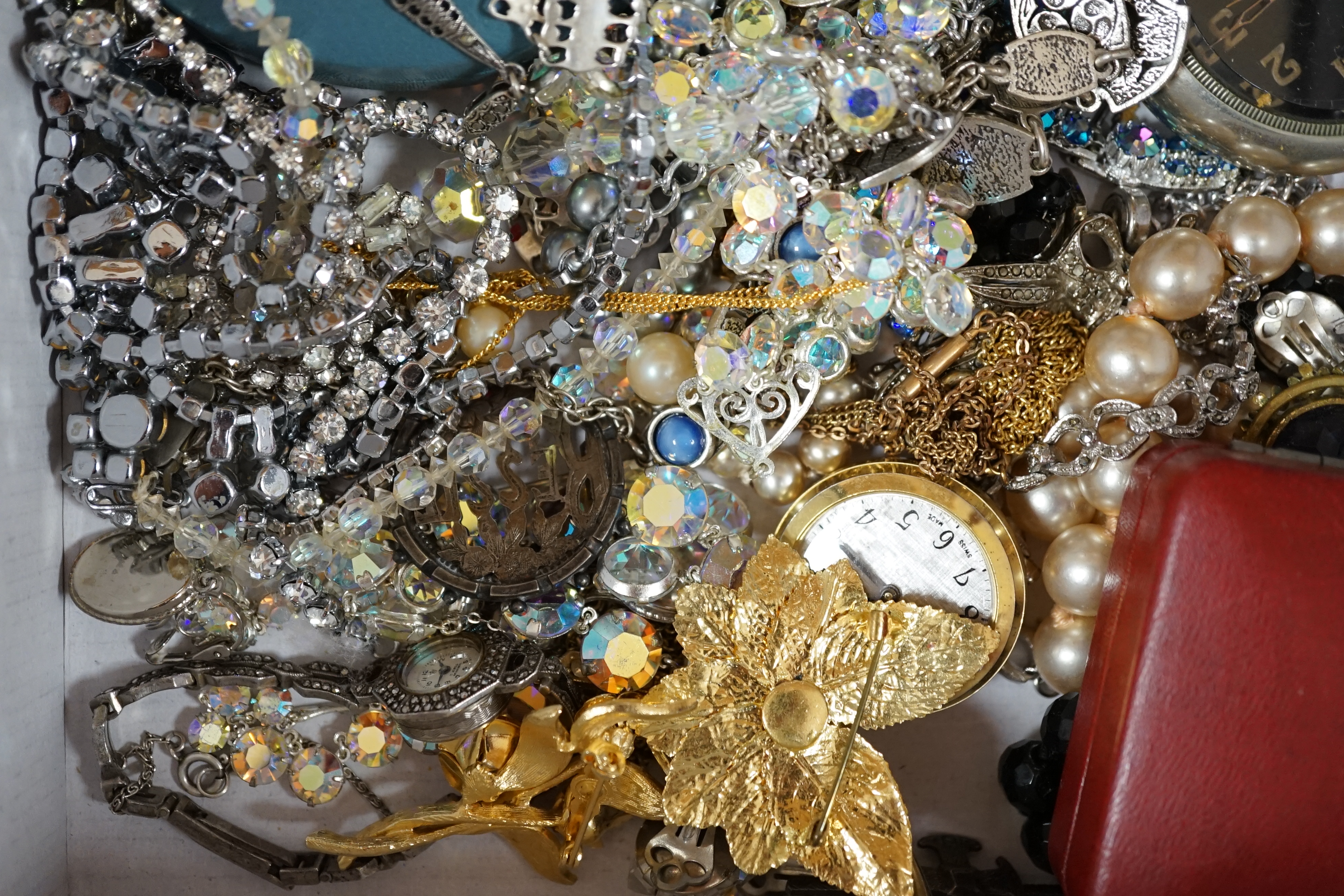 A collection of costume jewellery, some silver to include two 9ct gold cross pendants, marcasite brooches/necklaces and a pair of butterfly wing earrings. Condition - fair